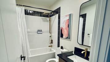 Hair dryer, towels, soap, toilet paper