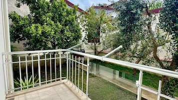 Family Apartment with Land or Pool View | In-room safe, iron/ironing board, free WiFi
