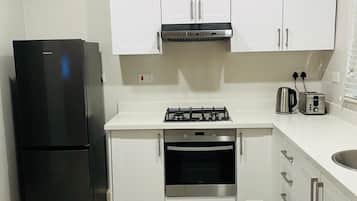 Appartement, 2 chambres, vue jardin, rez-de-chaussée | Cuisine privée