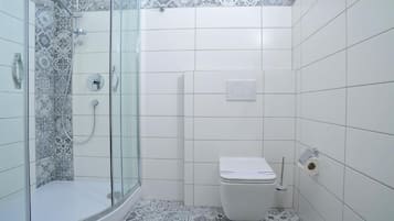 Double Room, City View | Bathroom | Shower, free toiletries, hair dryer, towels
