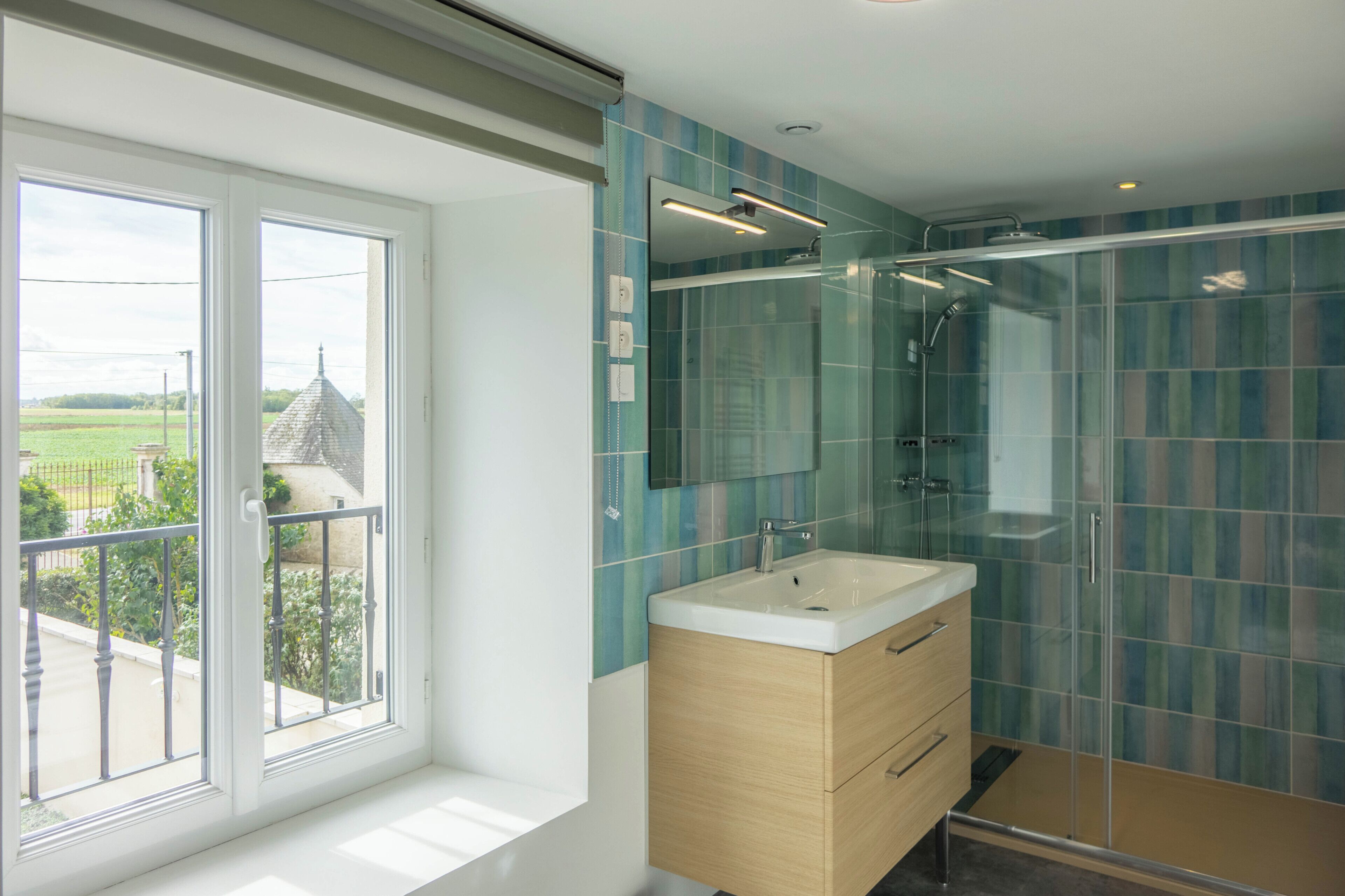 Shower, hair dryer, towels, toilet paper