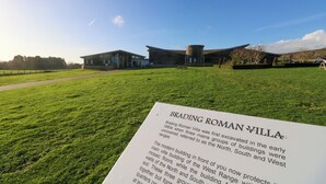 A sign with historical information about Brading Roman Villa. - 63 Crosswinds (Bembridge)