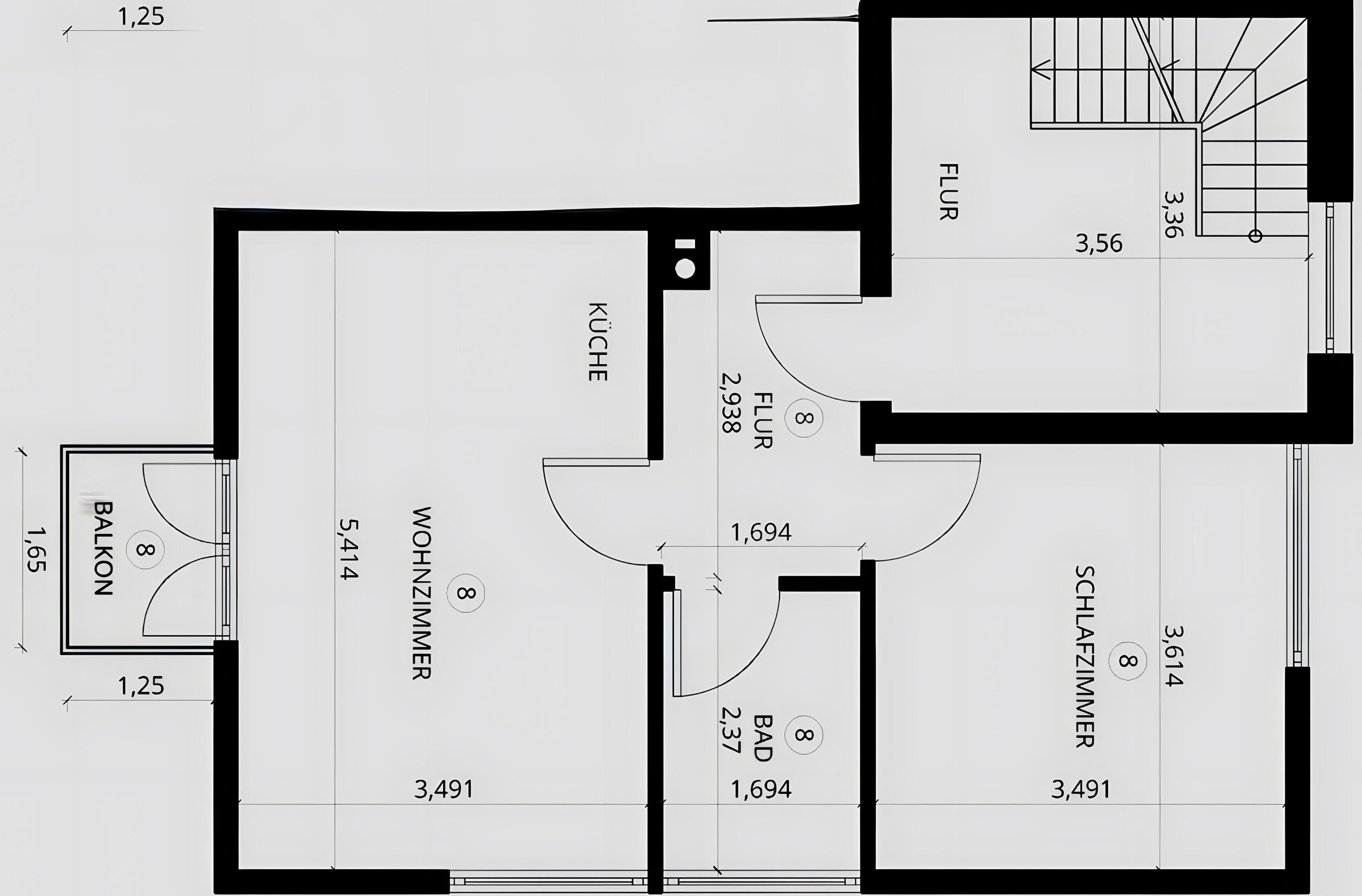 Un plan d’étage comprenant un salon, une cuisine, un balcon et une salle de bain.