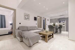 Apartment, 3 Bedrooms, Pool View | Living area | 32-inch Smart TV with cable channels - Athenia Apartments (Zakynthos)