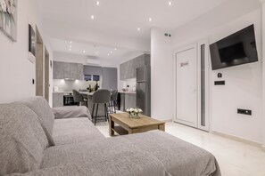 Apartment, 3 Bedrooms, Pool View | Living area | 32-inch Smart TV with cable channels - Athenia Apartments (Zakynthos)