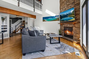 Smart TV, fireplace, books