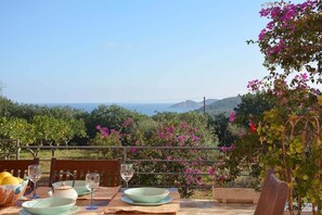 Outdoor dining - Villa Miquela Charming house with ocean view (IB)