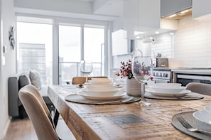 Grand Room, Balcony, City View | In-room dining