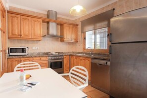 Fridge, microwave, toaster, cookware/dishes/utensils