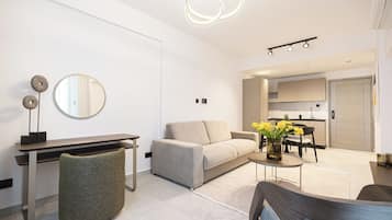 Superior Apartment, 1 Bedroom | Living area | 50-inch Smart TV with satellite channels, Netflix, streaming services