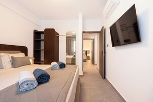 In-room safe, desk, laptop workspace, iron/ironing board