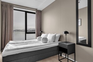 Premium Apartment, Partial Ocean View | Desk, laptop workspace, iron/ironing board, free WiFi - TotalApartments Gjøa Premium (Tromsø)