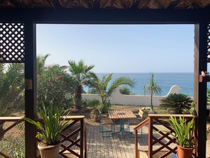 Outdoor dining - CAZA TROPIKAL large veranda Ponta Preta beautiful sea view close to everything (Vila do Maio)
