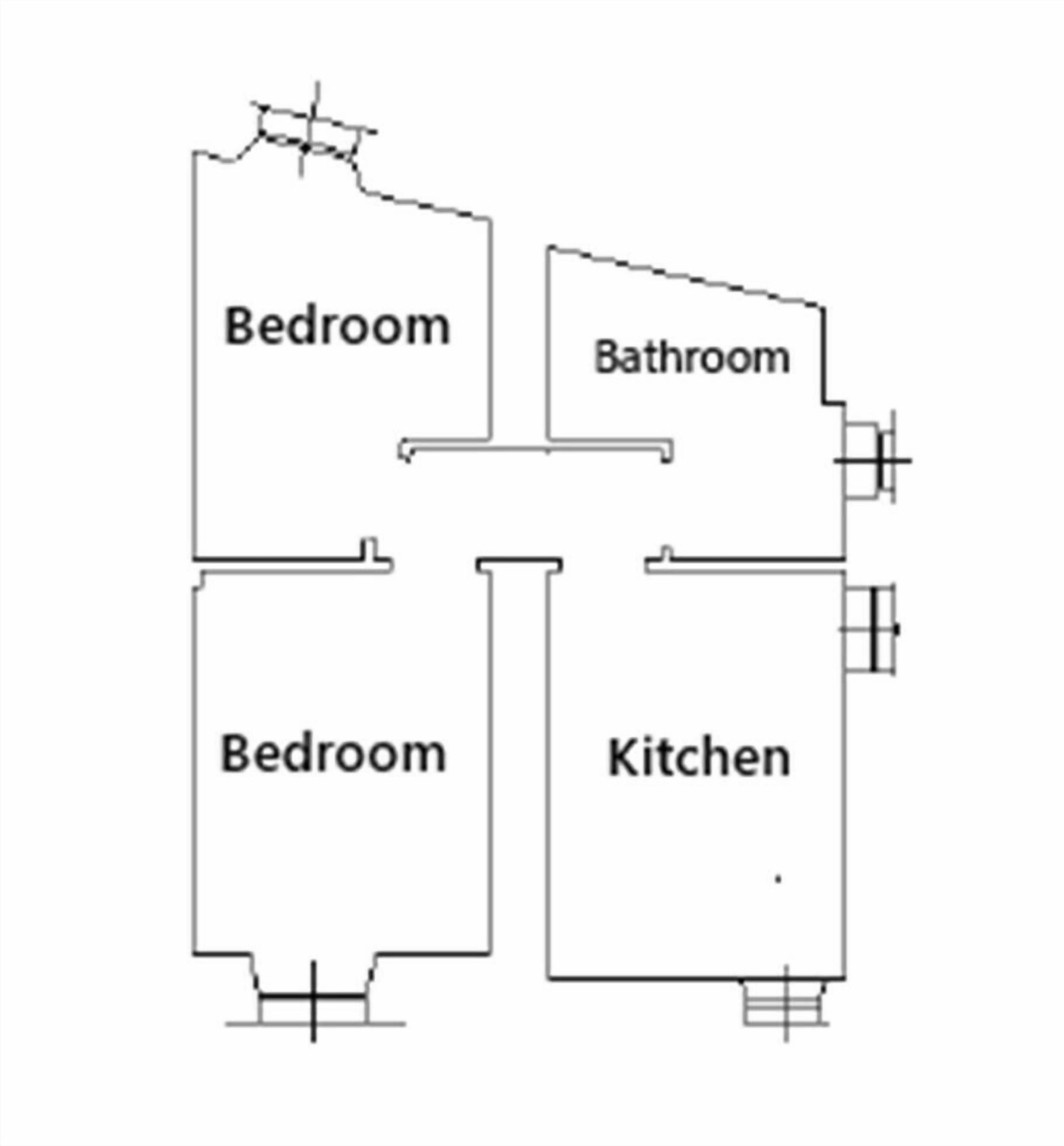 A floor plan with two bedrooms, a bathroom, and a kitchen.