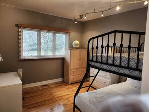 1 bedroom, desk, iron/ironing board, travel cot