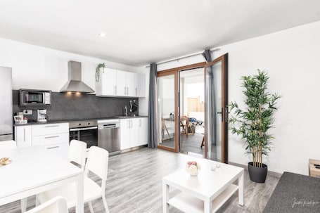 Fridge, microwave, oven, stovetop. Apartment 'Cerca Nueva B2' with Sea View, Wi-Fi and Air Conditioning