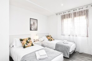 2 dormitorios, tabla de planchar con plancha, wifi y ropa de cama