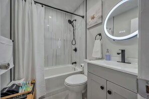 Hair dryer, towels, soap, shampoo