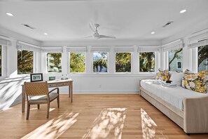 A room with a bed, a desk, and a chair. - Private Pool, 2 Min Walk to Beach, Perfect for Families and Couples (Isle of Palms)