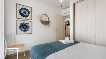 3 habitaciones, tabla de planchar con plancha, wifi y ropa de cama
