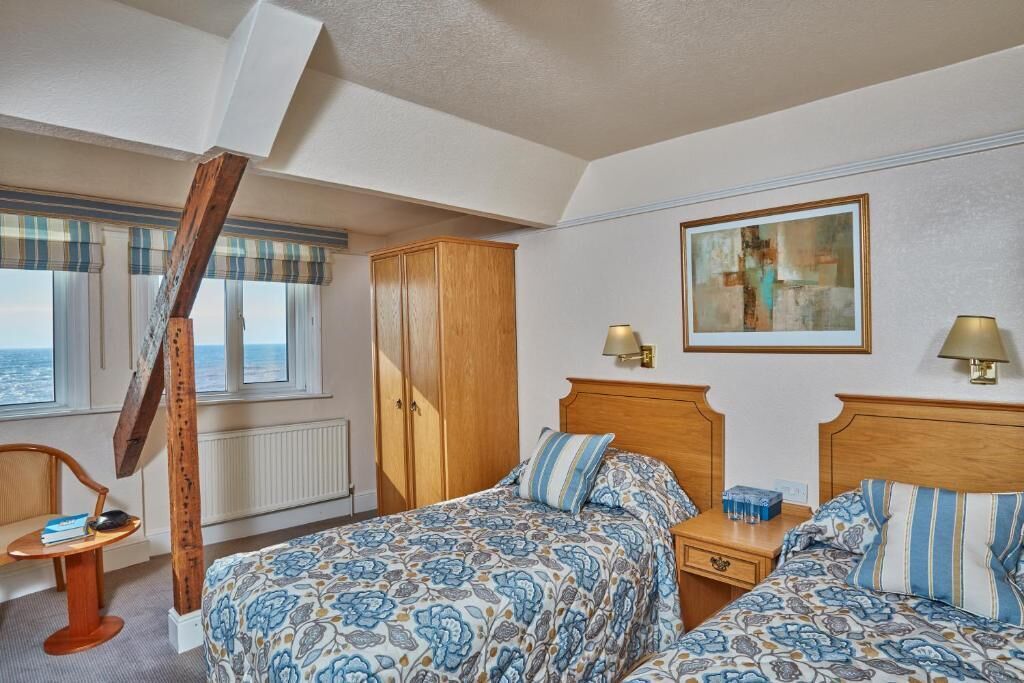 Quarto duplo, vista para o mar