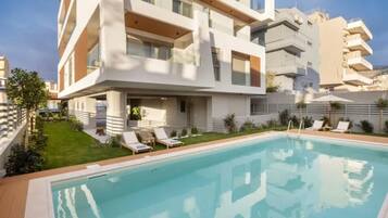 Deluxe Apartment, Garden View | Pool | Outdoor pool
