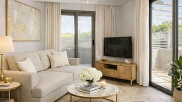 Deluxe Apartment, Garden View | Living area