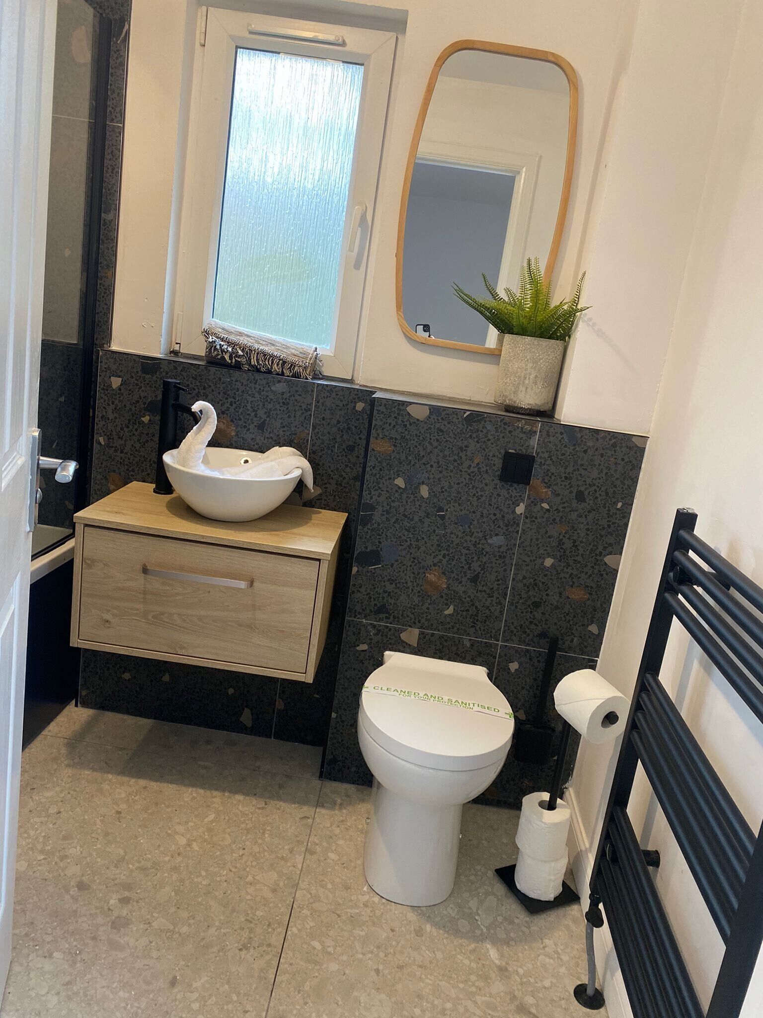 Combined shower/bathtub, deep-soaking bathtub, towels