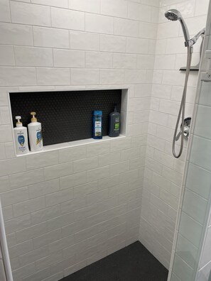 Shower, hair dryer, towels, soap