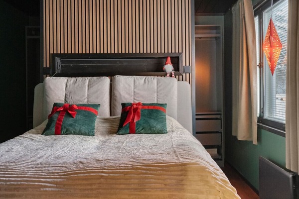 Bedroom 1 with double bed and wardrobe