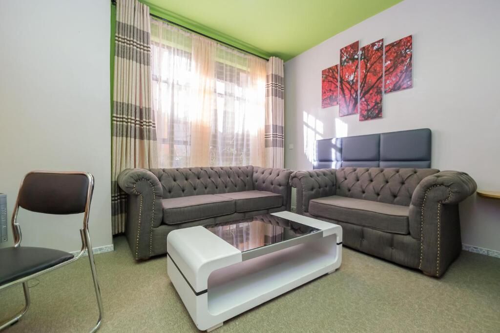 Habitació doble Deluxe, pati, vistes al jardí | Sala d'estar