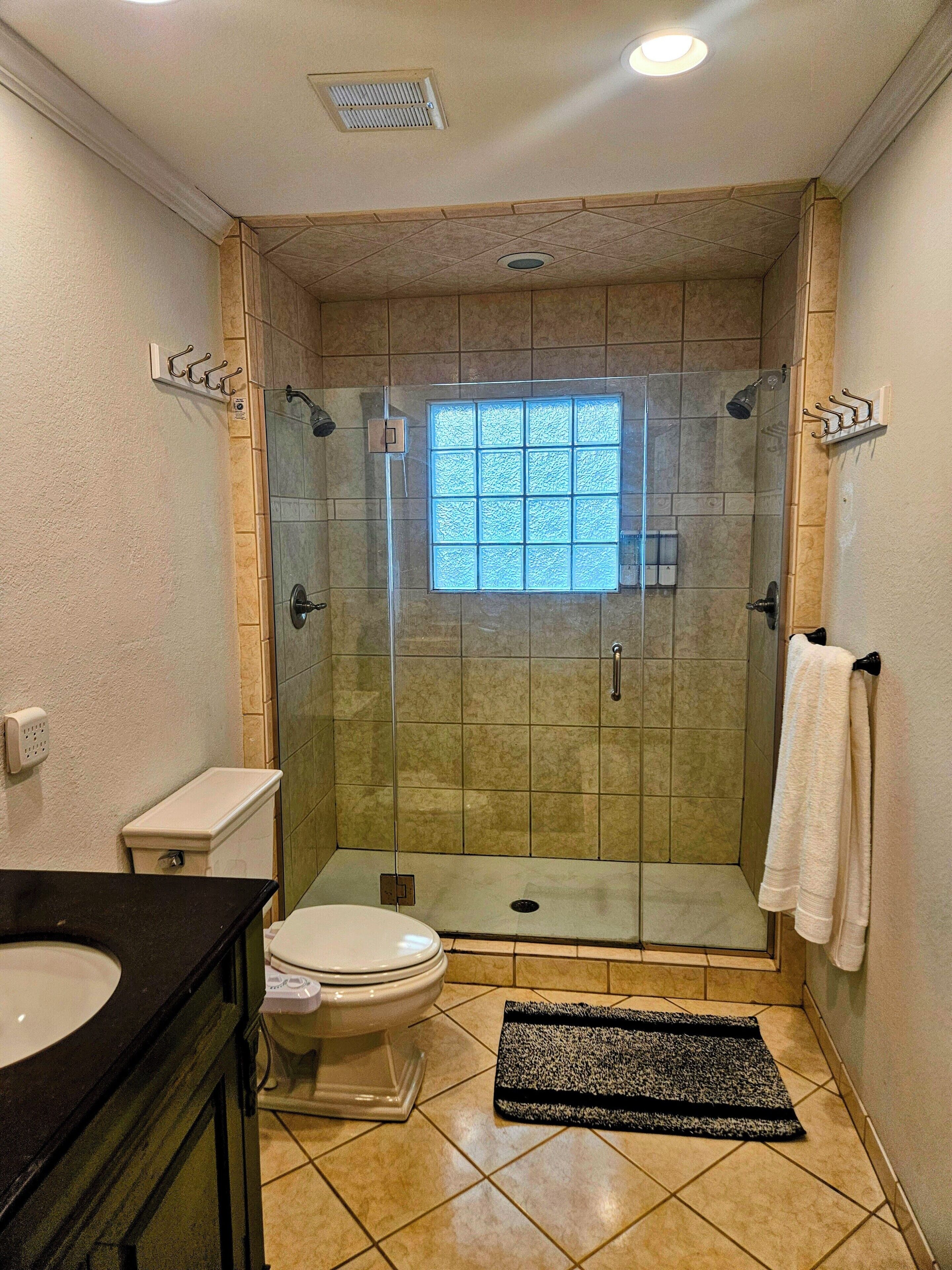 Bidet, towels, soap, toilet paper