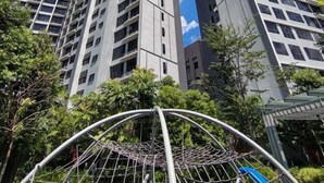 A high-rise building with a modern architectural design, featuring a grid of windows and balconies. - Agile Grand Prime  suite TRX by KL (Kuala Lumpur)