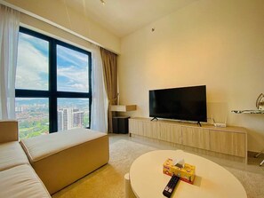 Luxury Suite | Living area | 55-inch LED TV with satellite channels, Netflix, streaming services - Agile Grand Prime  suite TRX by KL (Kuala Lumpur)