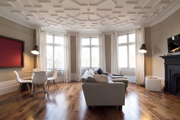 My living room is very large and bright.