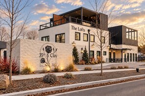 A modern building with a sign for 'The Lofts 35th & Clay LLC.' - The Lofts @35th and Clay - Loft A (Garden City)
