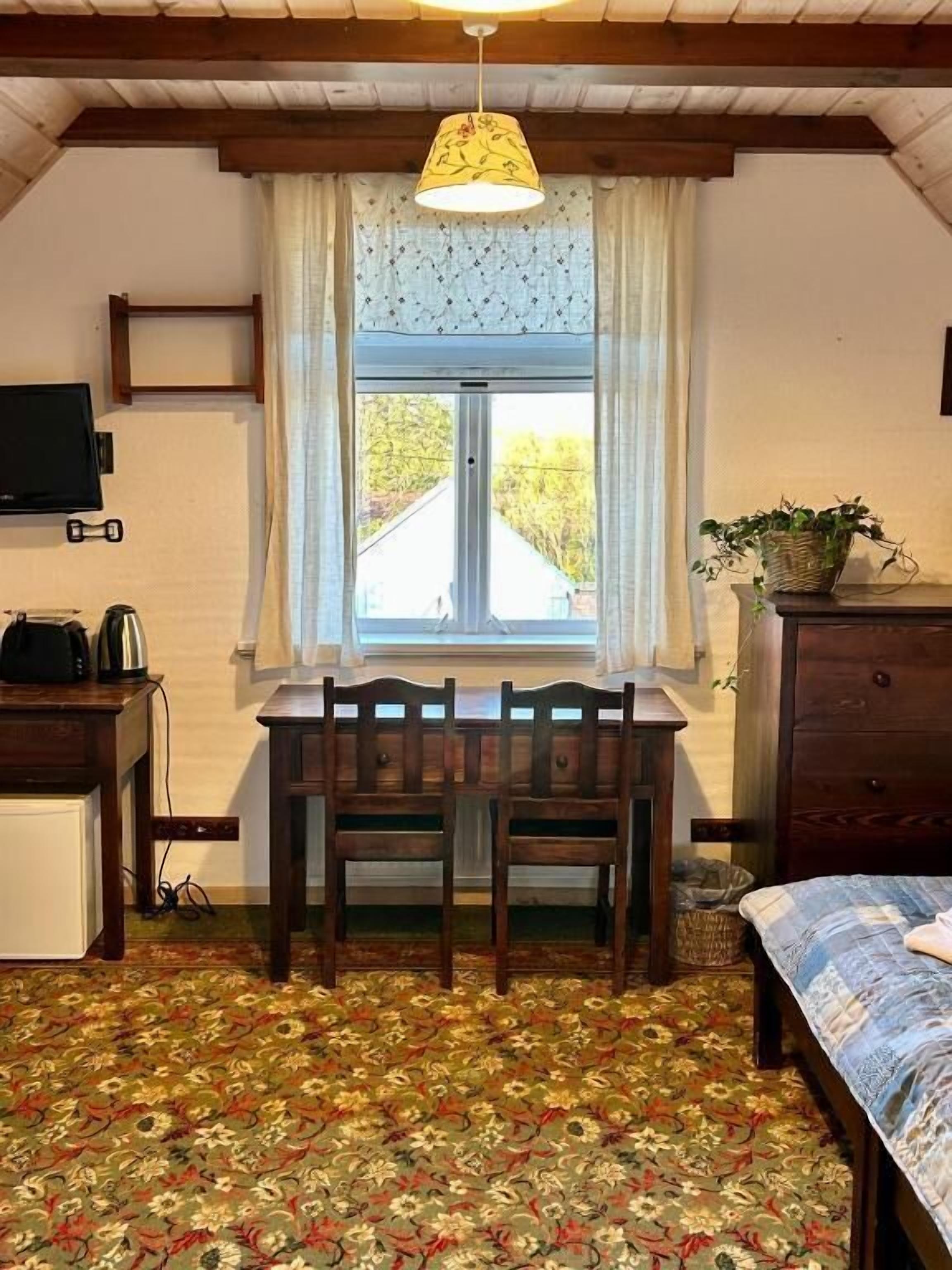 Standaard driepersoonskamer, uitzicht op tuin