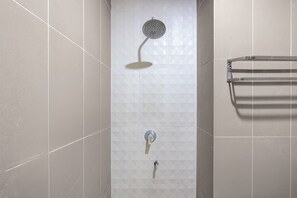 Suite Deluxe | Baño | Toallas, jabón, shampoo