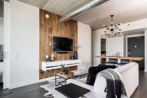 Living area - Modern High-Rise Condo | 2 Bed | 1 Bath | (Winnipeg)