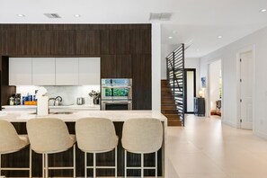 Fridge, microwave, oven, stovetop - Tiki on the River Luxury 5BR Resort Home- Heated Pool, Hot Tub, Movie RM & MORE! (Fort Lauderdale)