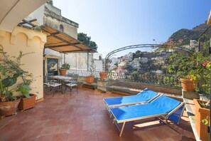 Outdoor dining - Alcova Apartment – Terrace with a View of Positano (Positano)