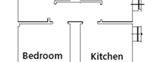 A floor plan with two bedrooms, a bathroom, and a kitchen.