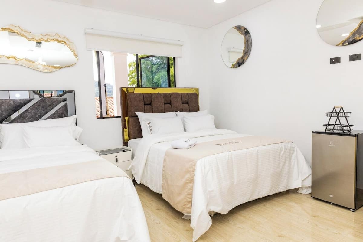 Quarto família, vista para a montanha