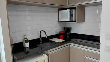 Departamento Deluxe, cocina, vista al río | Cocina privada