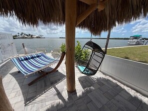 Terrace/patio - Waterfront Matlacha views! 2/2 Heated Pool Home (Matlacha)