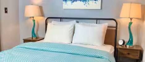 1 bedroom, desk, iron/ironing board, travel crib