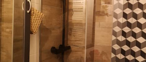 Shower, hair dryer, towels, soap