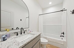 Hair dryer, towels, soap, shampoo