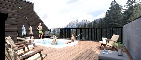 Una terraza de madera con un jacuzzi, sillas de descanso y vistas a las montañas.