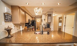 Fridge, microwave, oven, stovetop - Villa 2103 - 2 Bed / 2 Bath - Island Amenities (Lago Vista)